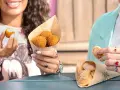 Disneyland Paris Snacks: Knusprige Kroketten und süße Poffertjes für einen magischen Tag.