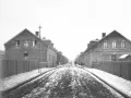 Alte Straße in Eisenheim, Oberhausen, mit Ziegelhäusern und Kopfsteinpflaster.